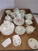 Vintage children's tea sets, half are stoneware,