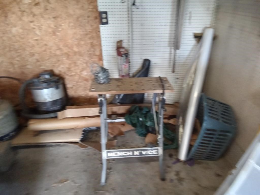bench with vise table,seeder,misc on wall