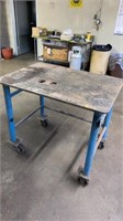 Steel table on casters 42” long 30” wide 37” high