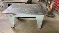 Metal rolling table 55” x 37.5”, 34” high, 1/2”