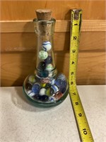 Glass jar w assorted marbles