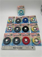 NEW Lot of 13- Squeezee Spinners