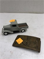 Belt Buckle & Toy Truck