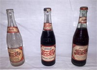Vintage Pepsi bottles w/ labels & contents.