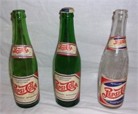 Vintage French Pepsi pop bottles.