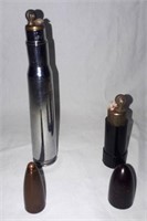 Vintage bullet shaped lighters.