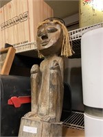 wooden statue carving