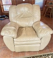 Cream colored leather rocker recliner