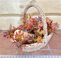 Wicker basket with fall decor