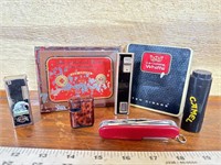 Vintage tobacco tins lighters and pocket knife