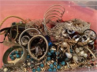 Plastic tote of jewelry/bracelets
