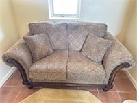 Loveseat with wood and nail head accents 70