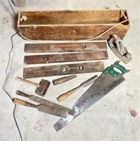 Antique toolbox filled with antique tools