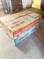 Two boxes of gas fireplace logs