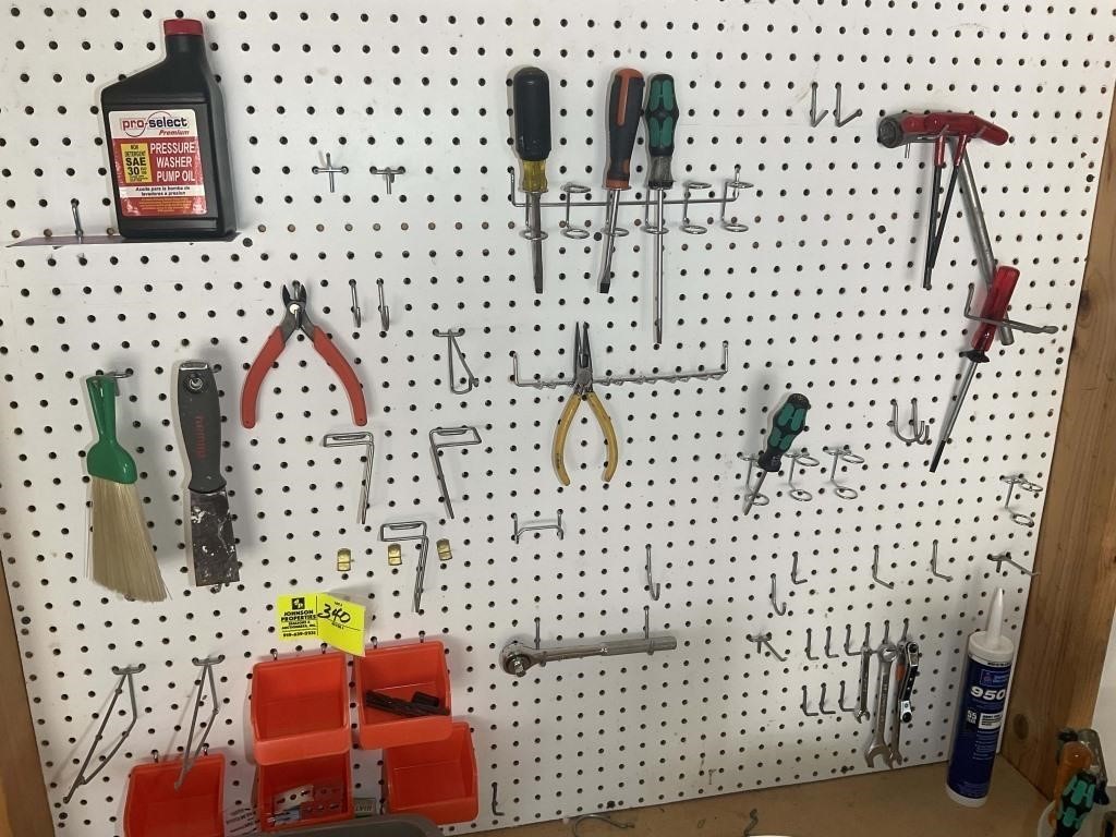GROUP OF HAND TOOLS AND CONTENTS ON WALL