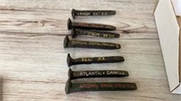 Painted railroad spikes, see names