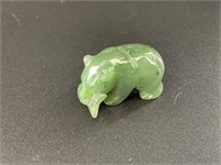 Alaskan Kobuk jade carved bear who has caught a la