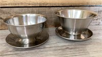 Two stainless steel gravy bowls