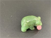 Alaskan Kobuk jade carved bear who has caught a la