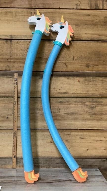 Two unicorn pool noodle water shooters