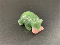 Alaskan Kobuk jade carved bear who has caught a la