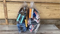 Two large bags of assorted phone cases and s