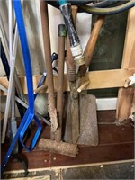 shovel pruners metal mallet and post