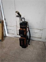 Spalding black and brown golf bag. Includes 12