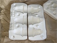 Shelf of casting molds of various designs