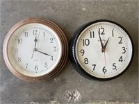 2 small wall clocks