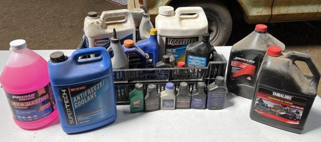 Various jugs of motor oil & 2 cycle oil