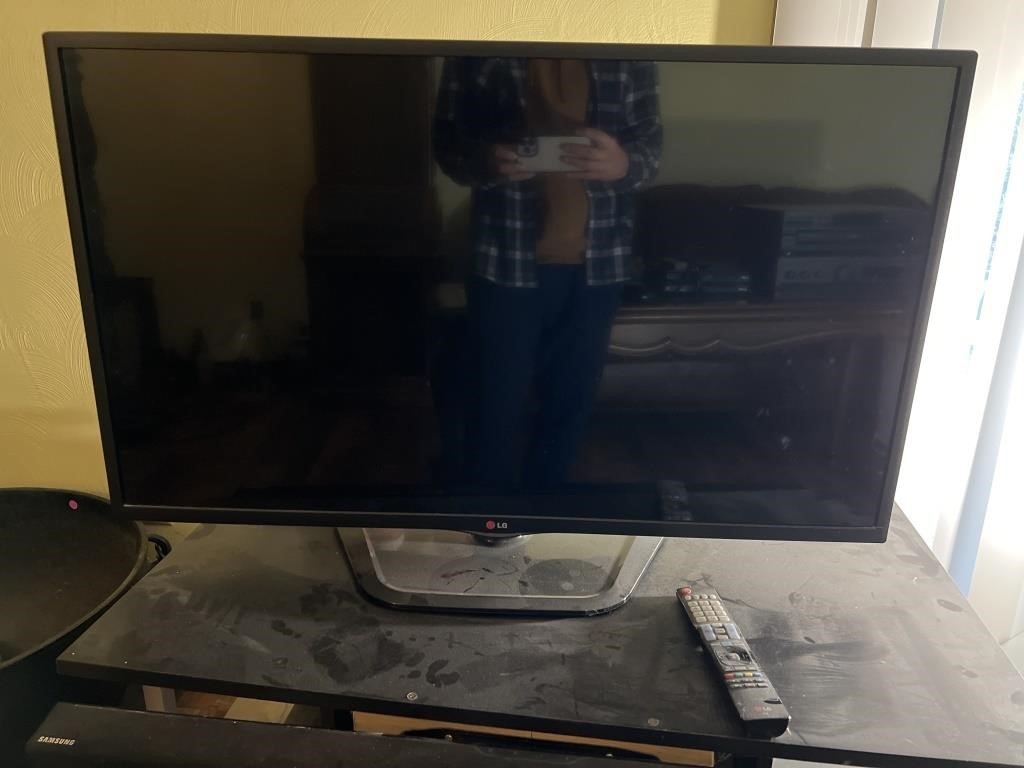 Roughly 40" LG tv w remote & HDMI chord