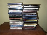 2 stacks of CDs, various Artists & genres