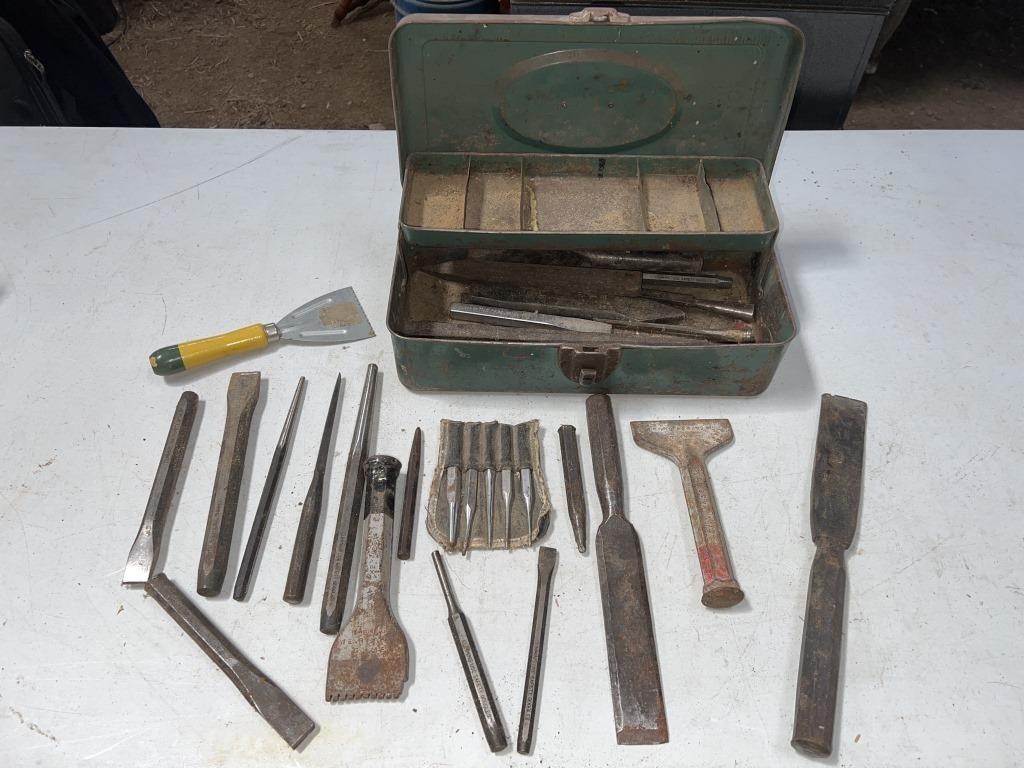 metal tool box filled w various sized chisels