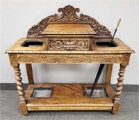 Carved oak foyer table with lion & umbrella