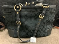 Coach handbag tote. In previously owned condition