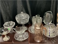 Assorted glassware. Butter dish, pitcher, vase,