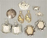 Group of sterling jewelry including pendants, etc.