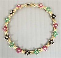 14K gold floral motif bracelet set with rubies,