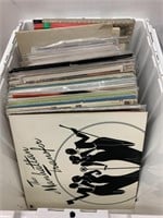 Assorted LP records, vintage playbooks and more.