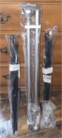 3 metal curtain rods (1 silver & 2 black)
