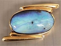 Tested 14K gold pin set with large cabochon opal