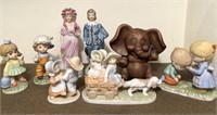 Multiple ceramic children and figurines