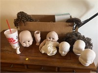 Box Of Porcelain Doll Pieces & Wigs