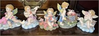 5 miniature angel statues
