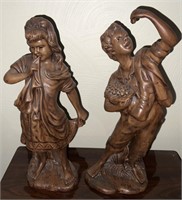 Statues of boy and girl (approx 1ft tall)