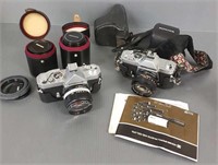 2 Konica 35 mm cameras & len's, etc.