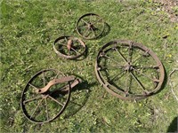 4 antique wheels (big one is roughly 3ft across)