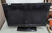 SHARP 42IN TV ON STAND, NO REMOTE