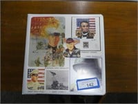 Album of war stamps, first day covers and misc. -